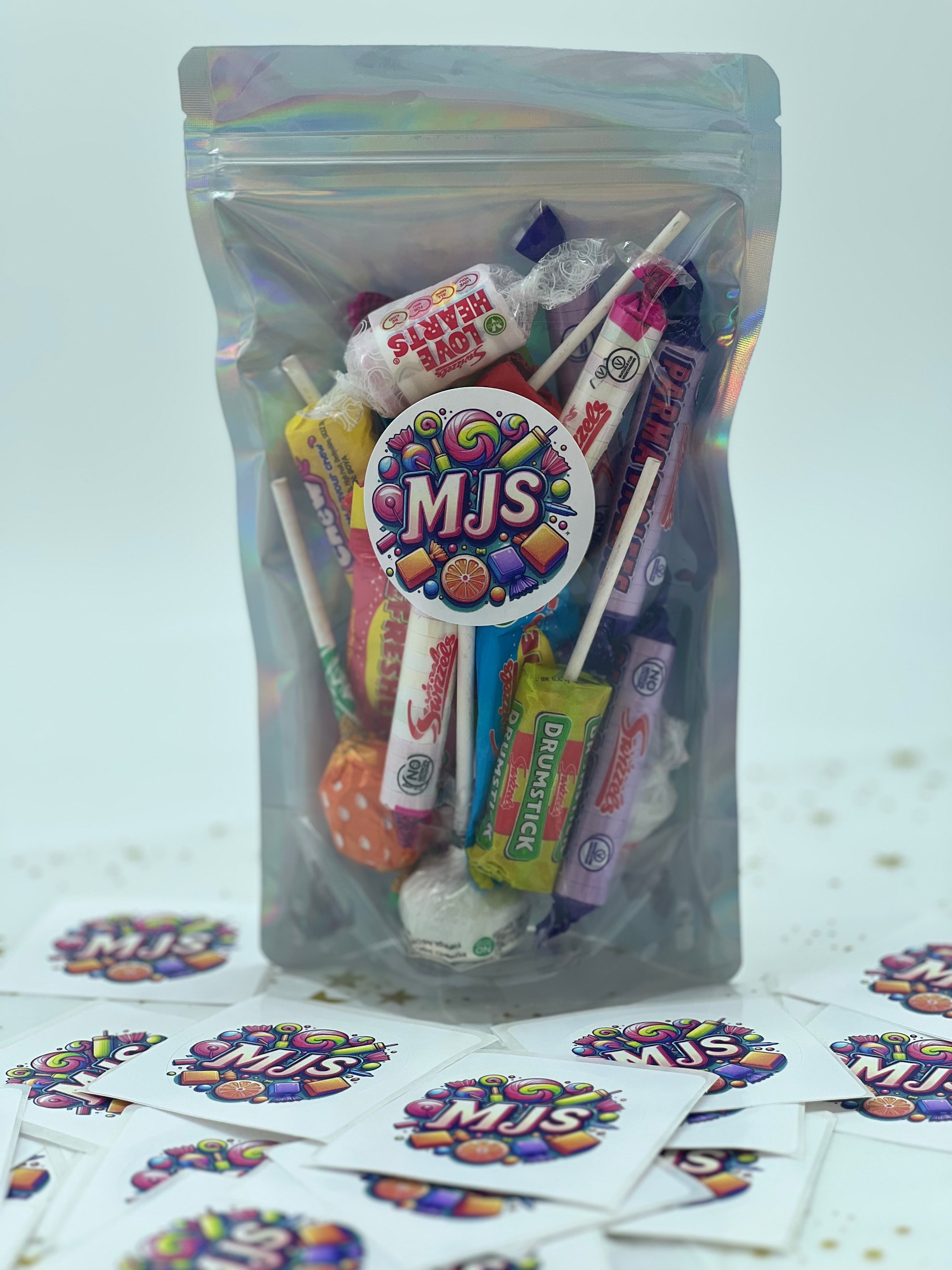MJ's Swizzles sweet bag including love hearts, drumsticks and lollipops