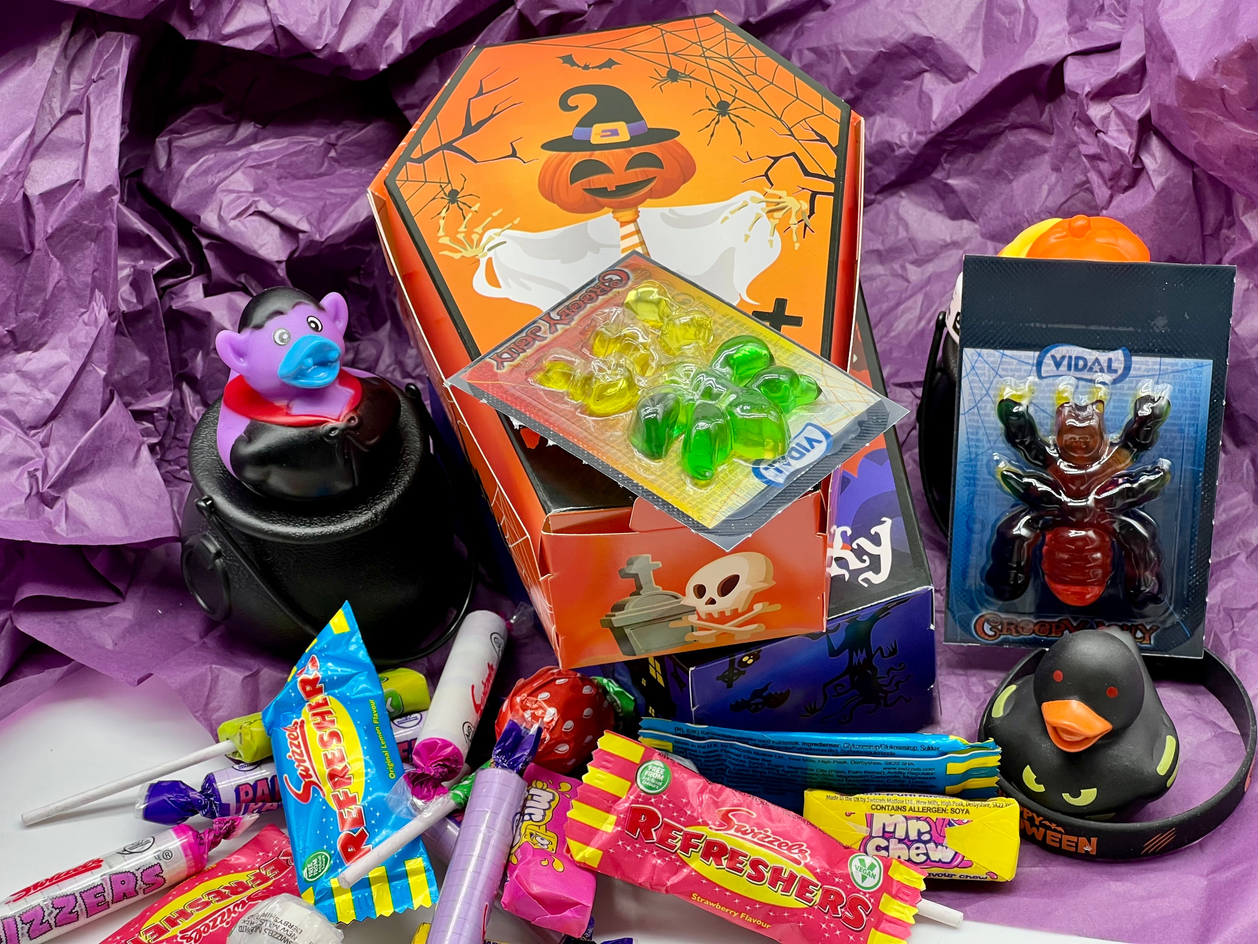 MJ's Halloween Coffin boxes filled with novelty items and sweets